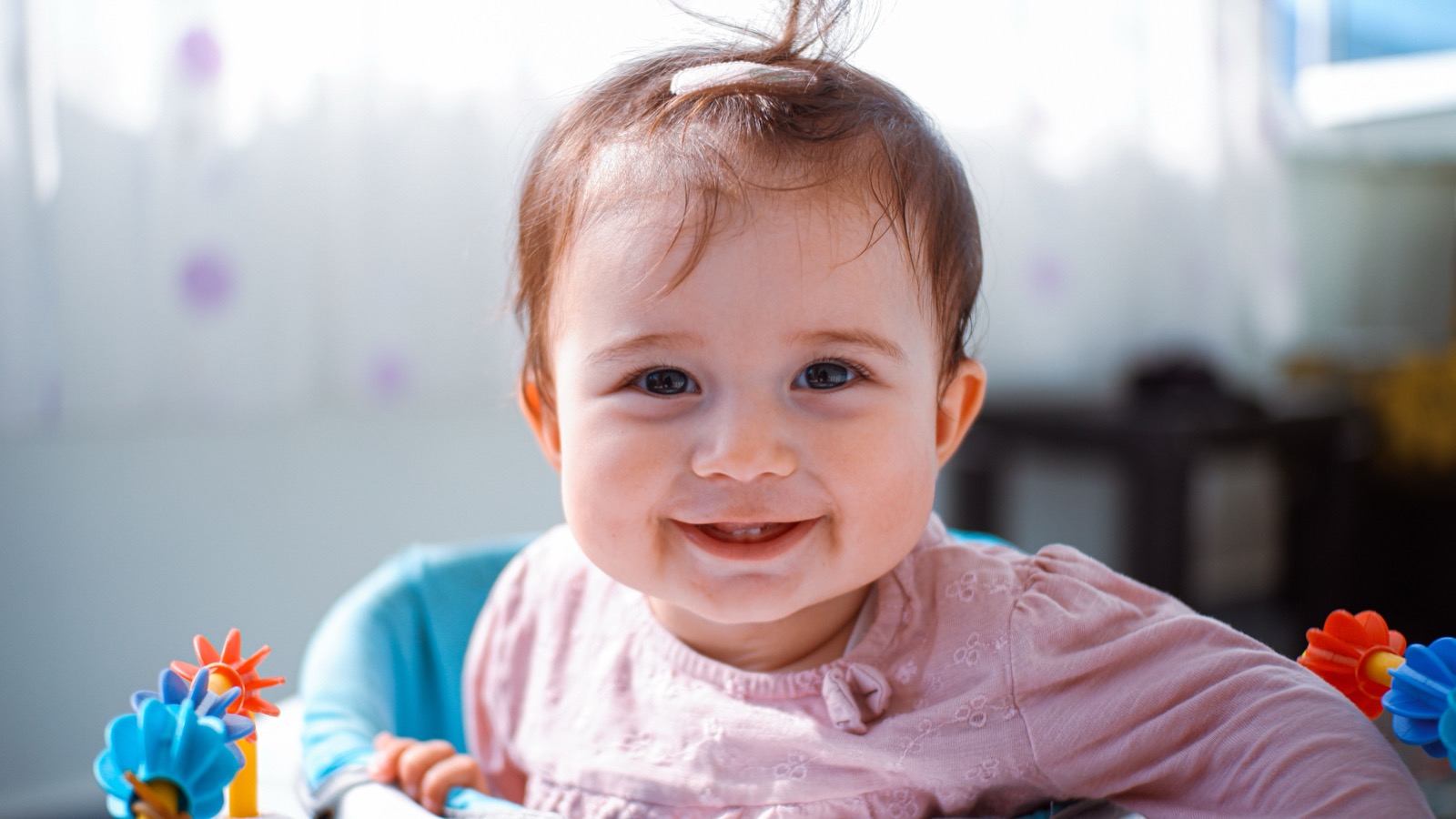 A smiling young child